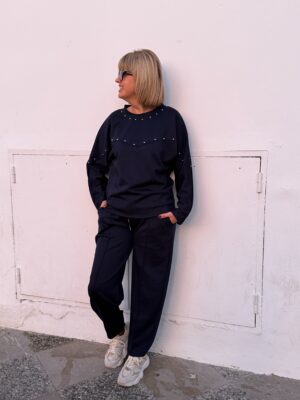 Conjunto Soft Glow tachuelas azul marino.