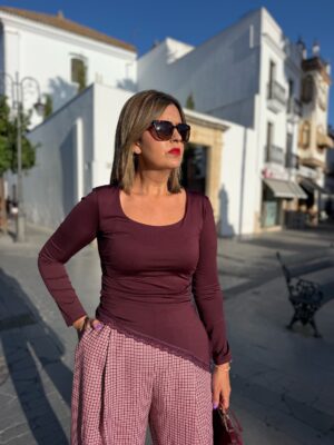Top Sara berengena.